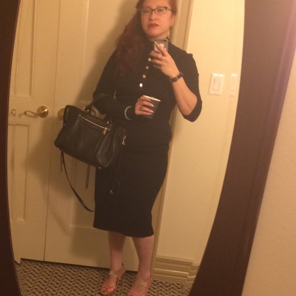 Beautiful black dress with gold snap buttons